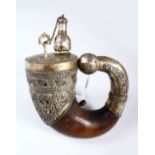 A GOOD EARLY ISLAMIC RHINO HORN AND SILVER MOUNTED COMPLETE POWDER FLASK, with onlaid and engraved