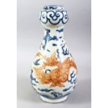 A CHINESE MING STYLE BLUE, WHITE & IRON RED PORCELAIN VASE, the body of the vase decorated with