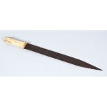 AN ISLAMIC SHORT SWORD WITH BONE HANDLE, the blade etched with calligraphy, 53.5cm long.