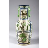 A QAJAR BALUSTER SHAPE VASE, painted with a male ruler, vases of flowers and animals, 28cm high.