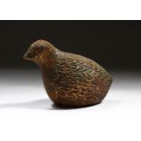 A SMALL ISLAMIC CAST BRONZE MODEL OF A QUAIL, 9.5cm wide.