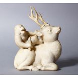 A LOVELY QUALITY JAPANESE MEIJI PERIOD CARVED IVORY OKIMONO - STAG AND MONKEY, the stag in a