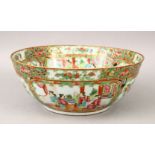A 19TH CENTURY CHINESE CANTON FAMILLE ROSE PORCELAIN BOWL, decorated with panels of figures interior