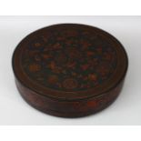 A 19TH / 20TH CENTURY CHINESE CIRCULAR LACQUER BOX & COVER, with decoration depicting flora and