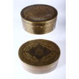 TWO GOOD INDIAN BRASS OVAL BOXES AND COVERS, with profusely engraved and enamelled decoration, 20cm