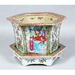 A 19TH CENTURY CHINESE CANTON FAMILLE ROSE PORCELAIN JARDINIERE & TRAY, the body of the jardinere