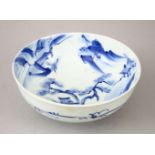 A 19TH CENTURY CHINESE BLUE & WHITE PORCELAIN BOWL, the interior decorated with views of a landscape