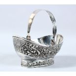 A 19TH CENTURY INDIAN WHITE METAL BASKET, with decoration depicting scenes of birds and flora,