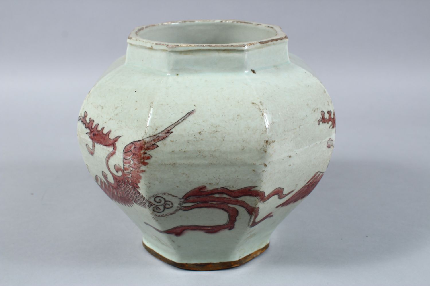 A CHINESE IRON RED DECORATED OCTAGONAL PORCELAIN JAR, the body of the jar decorated in iron red to - Image 4 of 8
