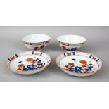 A PAIR OF 19TH / 20TH CENTURY CHINESE IMARI PORCELAIN CUPS & SAUCERS, decorated in the typical imari