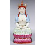 A GOOD CHINESE REPUBLIC STYLE FAMILLE ROSE PORCELAIN MODEL OF SEATED GUANYIN, seated upon a lotus