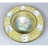 A LARGE & HEAVY QUALITY CHINESE ENAMEL CIRCULAR EUROPEAN SCENE DISH, the yellow ground decorated