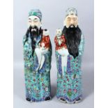 A GOOD PAIR OF CHINESE REPUBLIC STYLE FAMILLE ROSE PORCELAIN FIGURES OF IMMORTALS, the almost