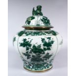 A CHINESE CRACKLE GLAZED FAMILLE VERTE PORCELAIN JAR & COVER, decorated with panels of floral