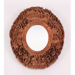 A GOOD 19TH CENTURY CHINESE CANTON CARVED SANDALWOOD MIRROR, the frame of the mirror with four