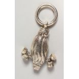 A NOVELTY SILVER OWL RATTLE AND TEETHING RING.