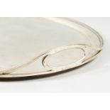 A RUSSIAN SAINT PETERSBURG SILVER PLAIN OVAL TWO-HANDLED TEA TRAY by KHLEBNIKOV. Mark BC over