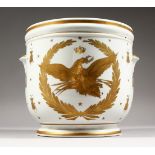 A CONTINENTAL PORCELAIN CACHE POT, gilt decorated with an eagle and insects. 8ins diameter.