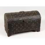 A 17TH / 18TH CENTURY DOME TOP CASKET covered with brass studded embossed metal. 19.5ins long x 9.