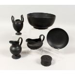 A BLACK BASALT CIRCULAR BOWL, and five small pieces (6).