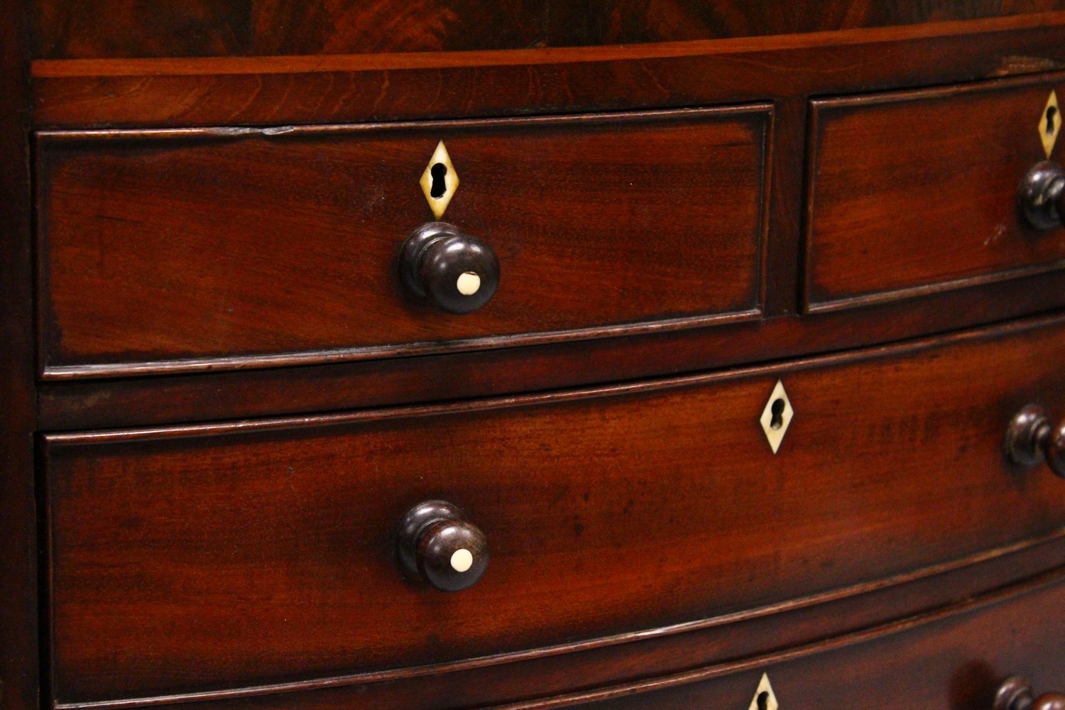 AN EARLY 19TH CENTURY MAHOGANY MINIATURE BOWFRONT CHEST, with two short and three long graduated - Image 4 of 8