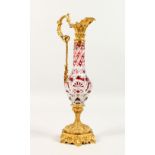 A SUPERB SWISS RED OVERLAY GLASS EWER with gilded metal frame. See label on base. 11ins high.