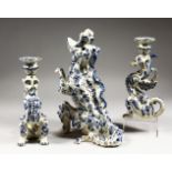A 20TH CENTURY DUTCH DELFT BLUE AND WHITE VASE, modelled as a dragon, seated with his mouth open;