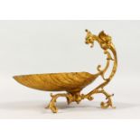 A 19TH CENTURY FRENCH GILT METAL SHELL DISH, with griffin handle. 10ins long.