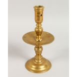 A 17TH CENTURY HEEMSKIRK CANDLESTICK. 9ins high.