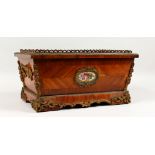 A GOOD 19TH CENTURY FRENCH KINGWOOD RECTANGULAR PLANTER, with Sevres panel and gilt metal mounts.