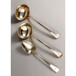 A PAIR OF GEORGE III SAUCE LADLES, London 1801, Maker: Bateman, and A VICTORIAN SPOON.