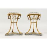 A PAIR OF 19TH CENTURY FRENCH PEDESTAL SALTS, with glass liners, curving legs and marble bases. 6ins