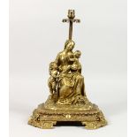 A GOOD BRONZE LAMP, modelled as a seated woman, holding a child, another child by her side, on an