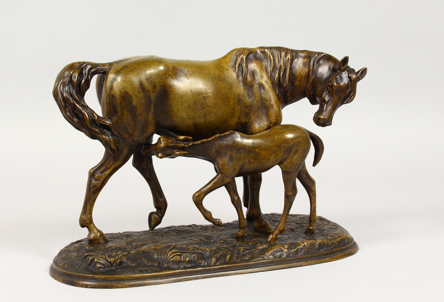 C. FRATIN (1800-1864) FRENCH A bronze mare and foal. Signed FRATIN. 10ins long x 7ins high.