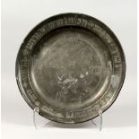 A RARE GERMAN PEWTER PASSOVER PLATE, CIRCA 1800, JUDAICA engraved with emblems. 15ins diameter.