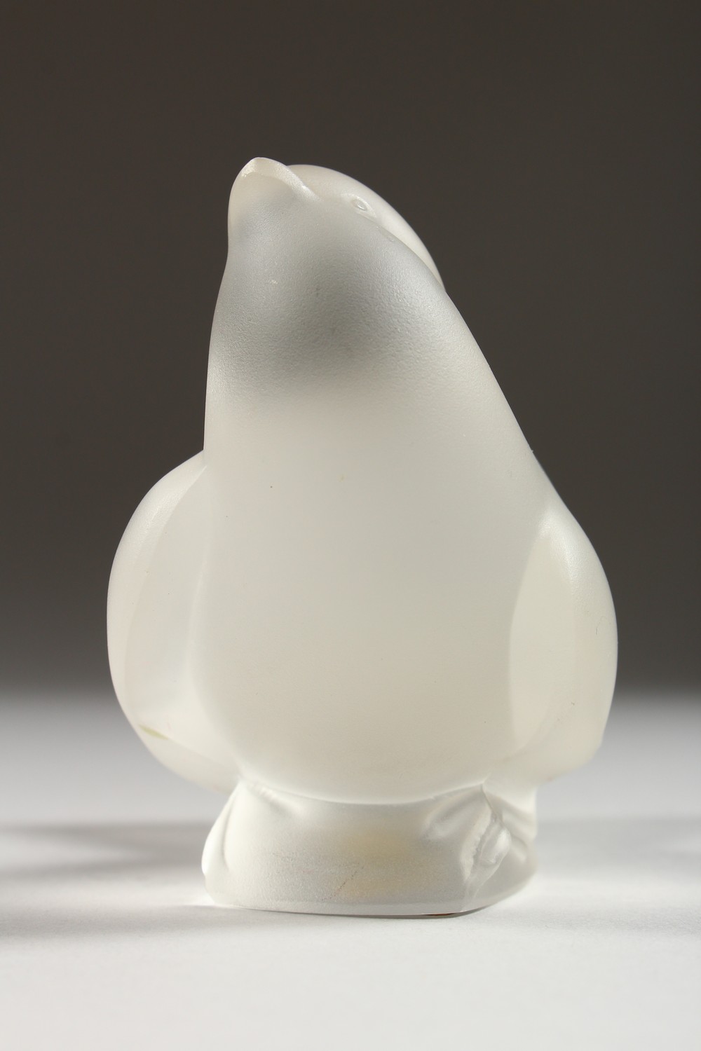 A LALIQUE FROSTED GLASS MODEL OF A BIRD, seated with folded wings, (small tail chip). 4ins long. - Image 3 of 8