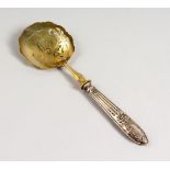 A CONTINENTAL STRAWBERRY SERVING SPOON, boxed. 10ins long.
