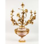 A GOOD LARGE LOUIS XVI ROUGE URN SHAPED MARBLE LAMP, with rams mask handles and six scrolling