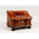 A 17TH CENTURY ITALIAN WALNUT AND MARQUETRY SEWING BOX of shaped form, the sloping top opening to