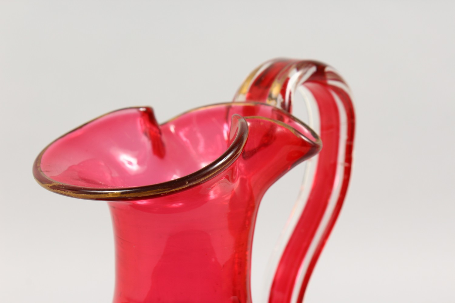 A VICTORIAN RUBY GLASS JUG. 9.5ins high. - Image 2 of 11