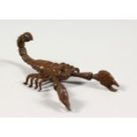 A JAPANESE BRONZE ARTICULATED MODEL OF A SCORPION. 3.5ins long.