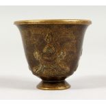 A SMALL CHINESE BRONZE CUP. 1.75ins high.