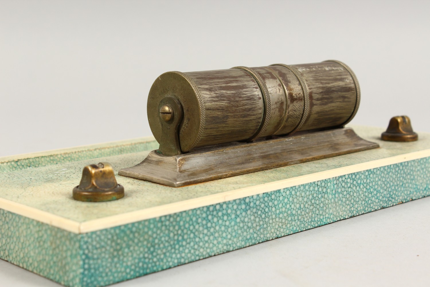 A SHAGREEN DESK STAND, EARLY 20TH CENTURY, mounted with a plated perpetual calendar. 10ins long x - Image 3 of 3