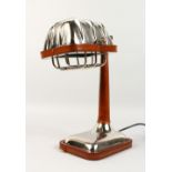 AN UNUSUAL CHROME AND LEATHER BULKHEAD STYLE TABLE LAMPS. 15ins high.