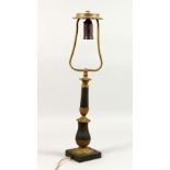 A 19TH CENTURY FRENCH BRONZE LAMP, on a square base. 22ins high.