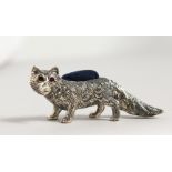 A NOVELTY SILVER FOX PIN CUSHION.