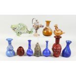 A GOOD COLLECTION OF "ROMAN" COLOURED GLASS BOTTLES AND JARS, including a model of a fish (11).