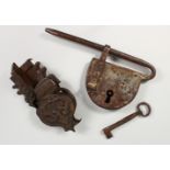 TWO EARLY WROUGHT IRON LOCKS, one with a key. 9ins and 7ins.