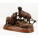 JULES MOIGNIEZ (1835-1894) FRENCH "MERINOS NES A WILDEVILLE". A good cast bronze group of a merino