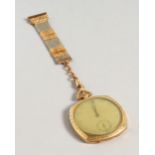 A GILT METAL MOUNTED FOB WATCH AND CHAIN.